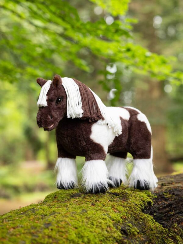 brown and white stuffed toy horse