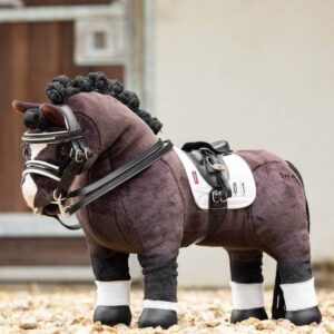 black dressage saddle on horse