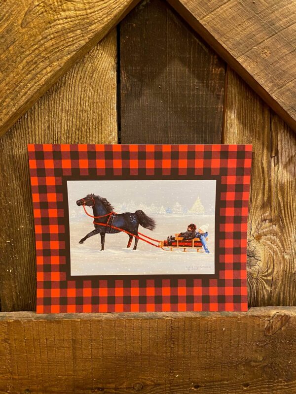 8x10 print- red and black border check pattern- print of a mini horse pulling 2 children in a sleigh on a snowy day.